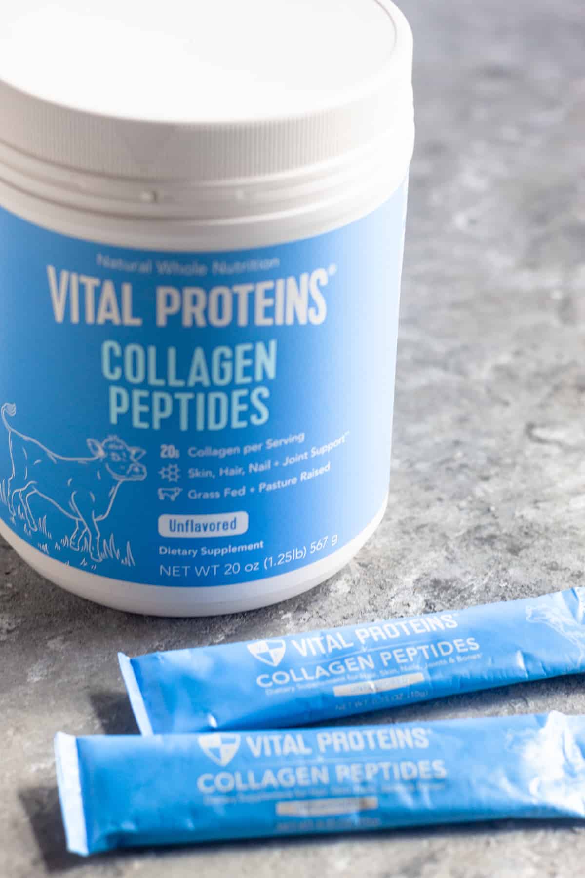 A container and a small packer of Vital Proteins Collagen Peptides.