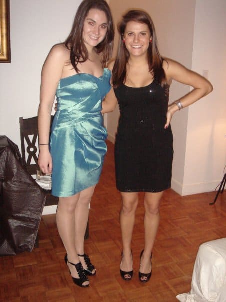 Two girls in dresses getting ready to go out for New Year's Eve
