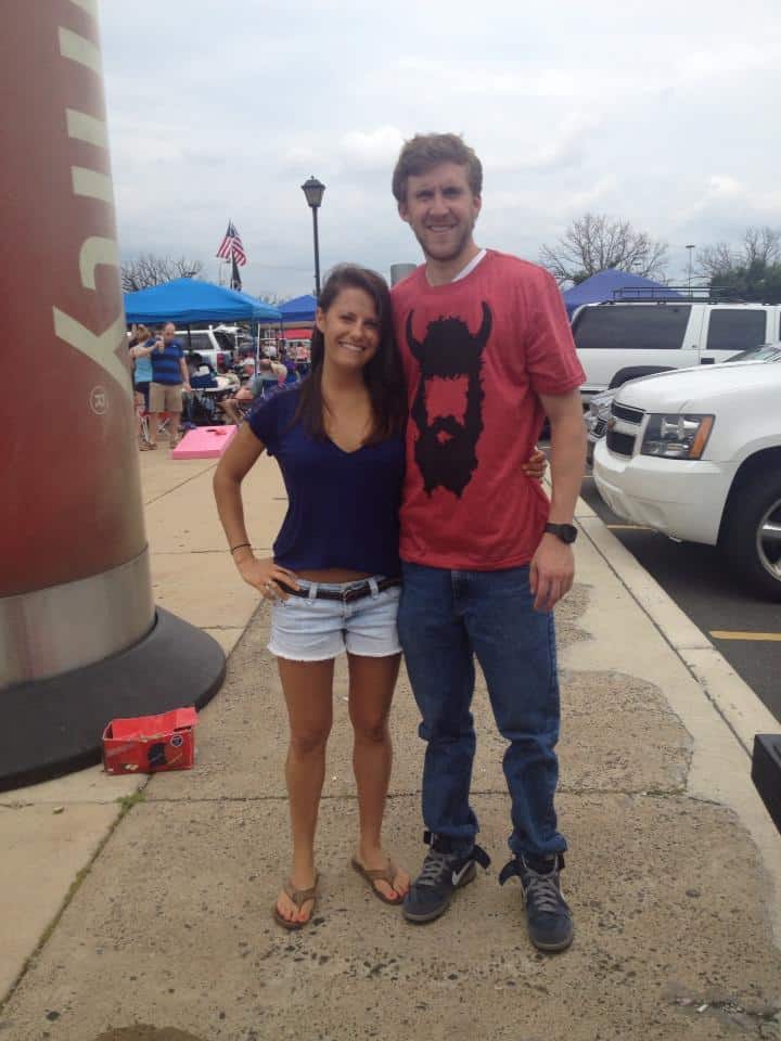 Boyfriend and girlfriend posing for a picture