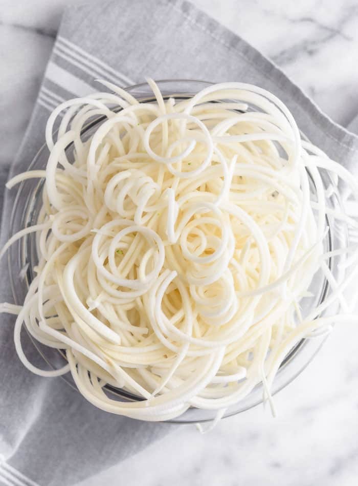 A bowl of spiralized turnip noodles.