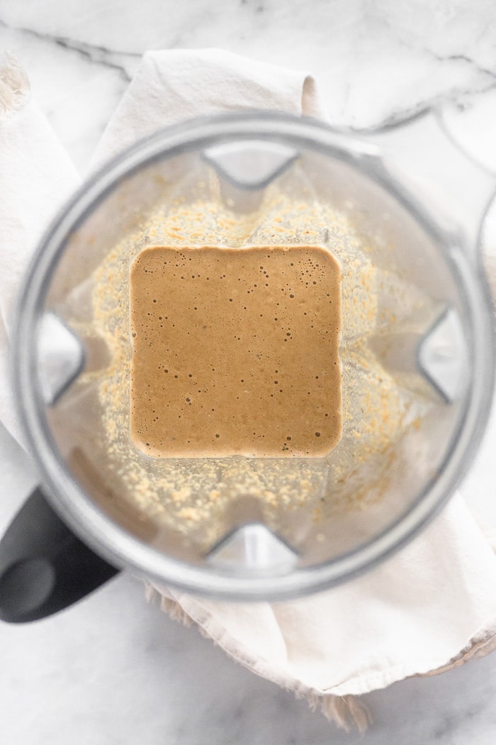 Blender filled with creamy balsamic dressing.