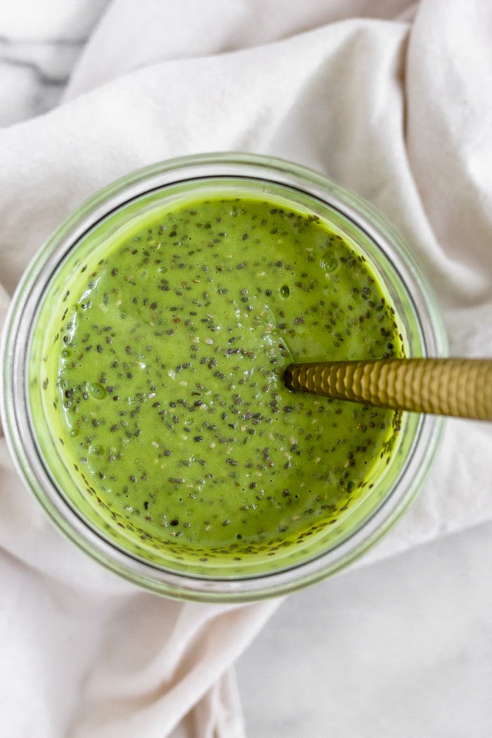 Matcha chia pudding before the the chia seeds absorb the liquid.