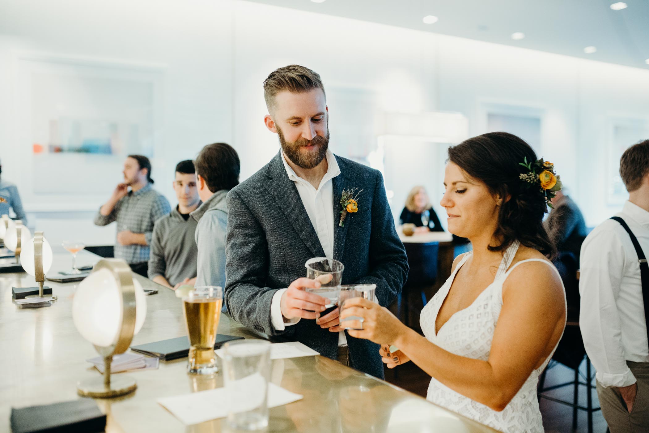 Bride and groom taking a tequila shot before they get married.