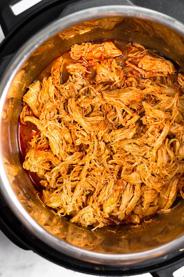 Instant Pot buffalo chicken in a pressure cooker.