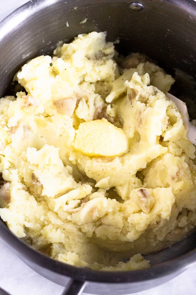 Lactose free mashed potatoes in a large pot.
