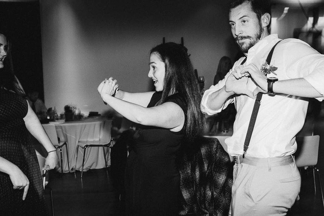 Guy and a girl dancing to "God's Plan" by Drake at a wedding.
