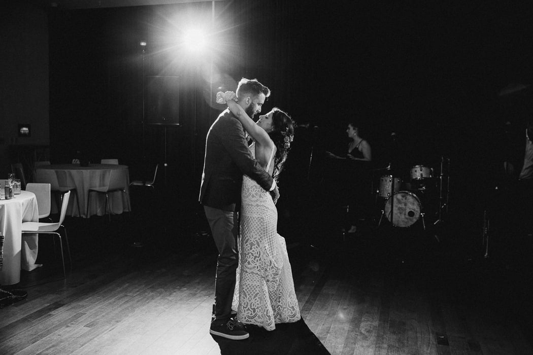 Bride and groom dancing on their wedding day to the last dance song with no one around them.