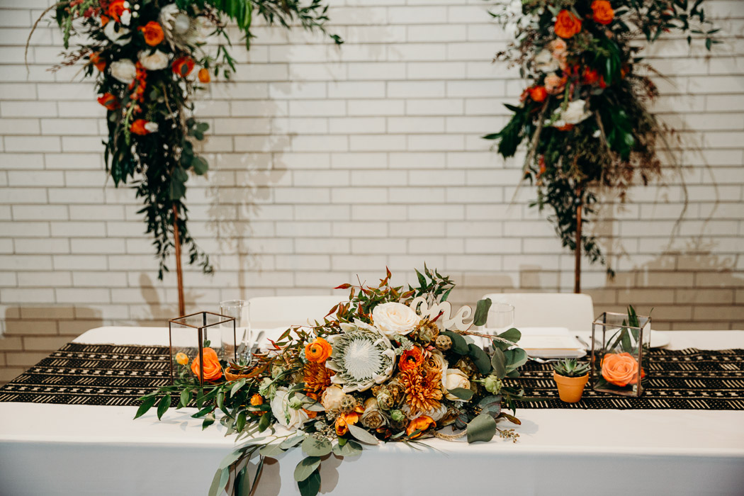 Bride's bouquet of flowers on the couple's table a wedding.