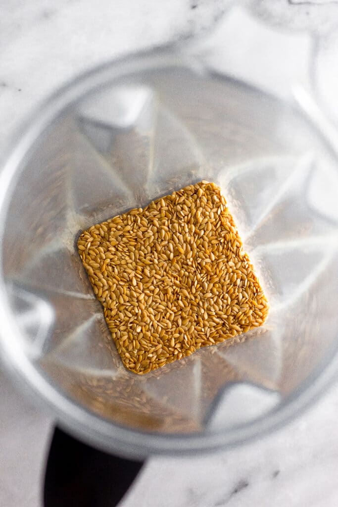 Blender filled with flax seeds.