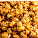 A close up shot of homemade caramel popcorn in a white bowl.