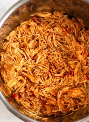 Instant Pot filled with shredded bbq chicken.