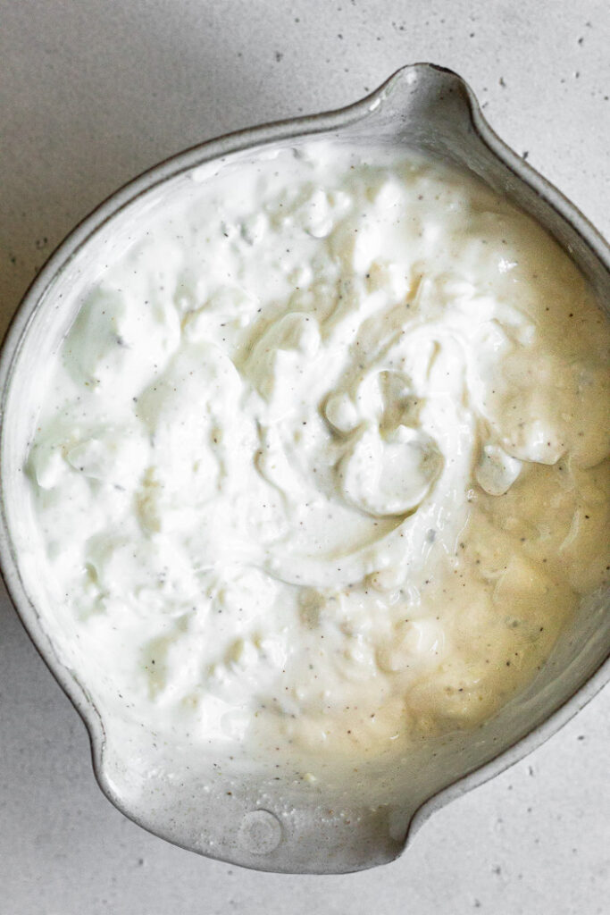Overhead shot of healthy blue cheese dressing in a bowl.