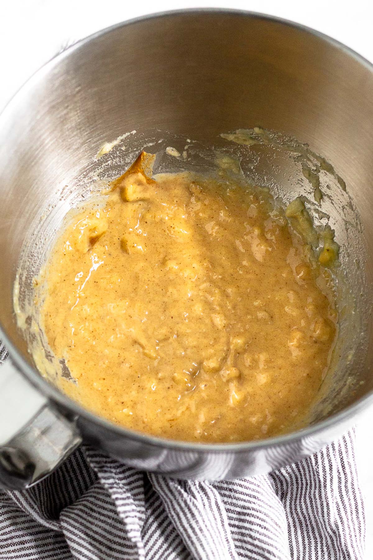 Large bowl filled with a peanut butter batter.