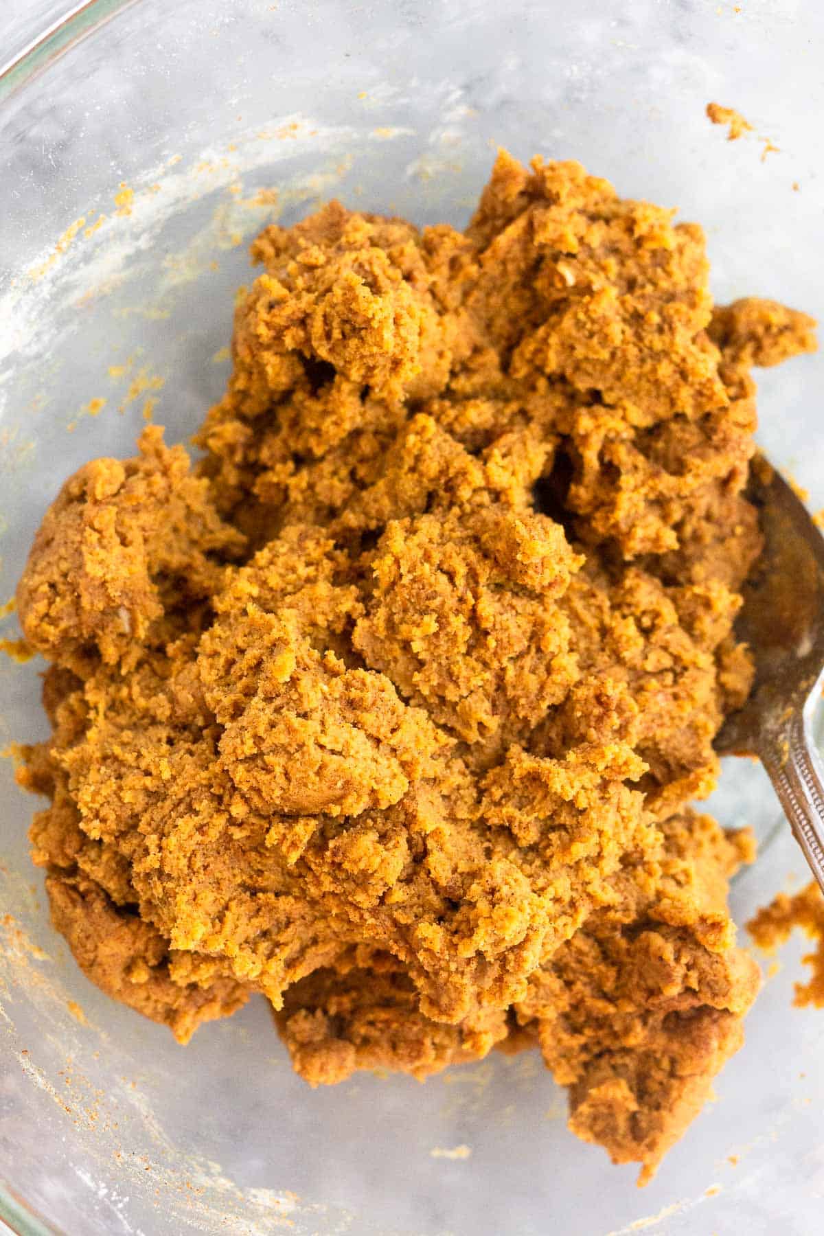 Protein cake ball dough in a glass bowl.