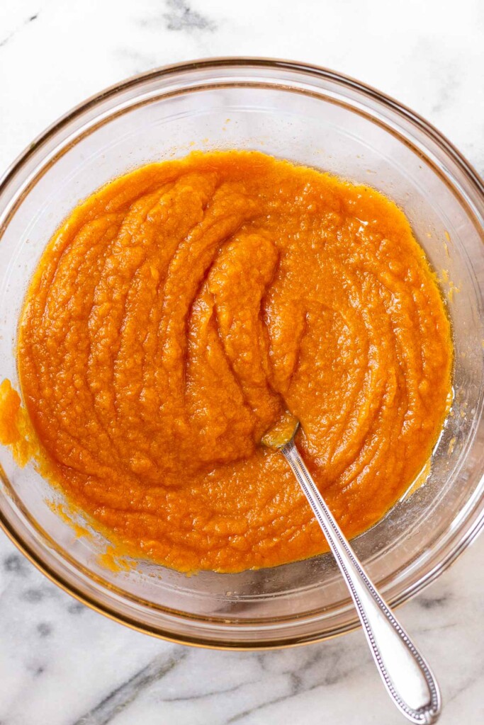 Wet batter in a bowl with a fork in it.