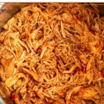 Instant Pot filled with shredded bbq chicken.