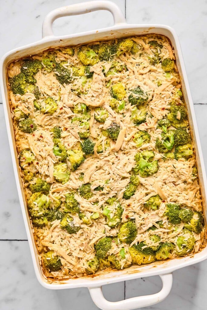 Chicken broccoli and rice casserole in a large baking dish.