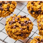 Pumpkin oatmeal muffins on a metal cooling rack.