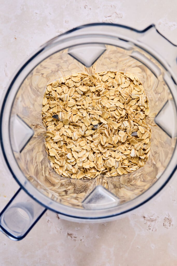 Blender filled with rolled oats.